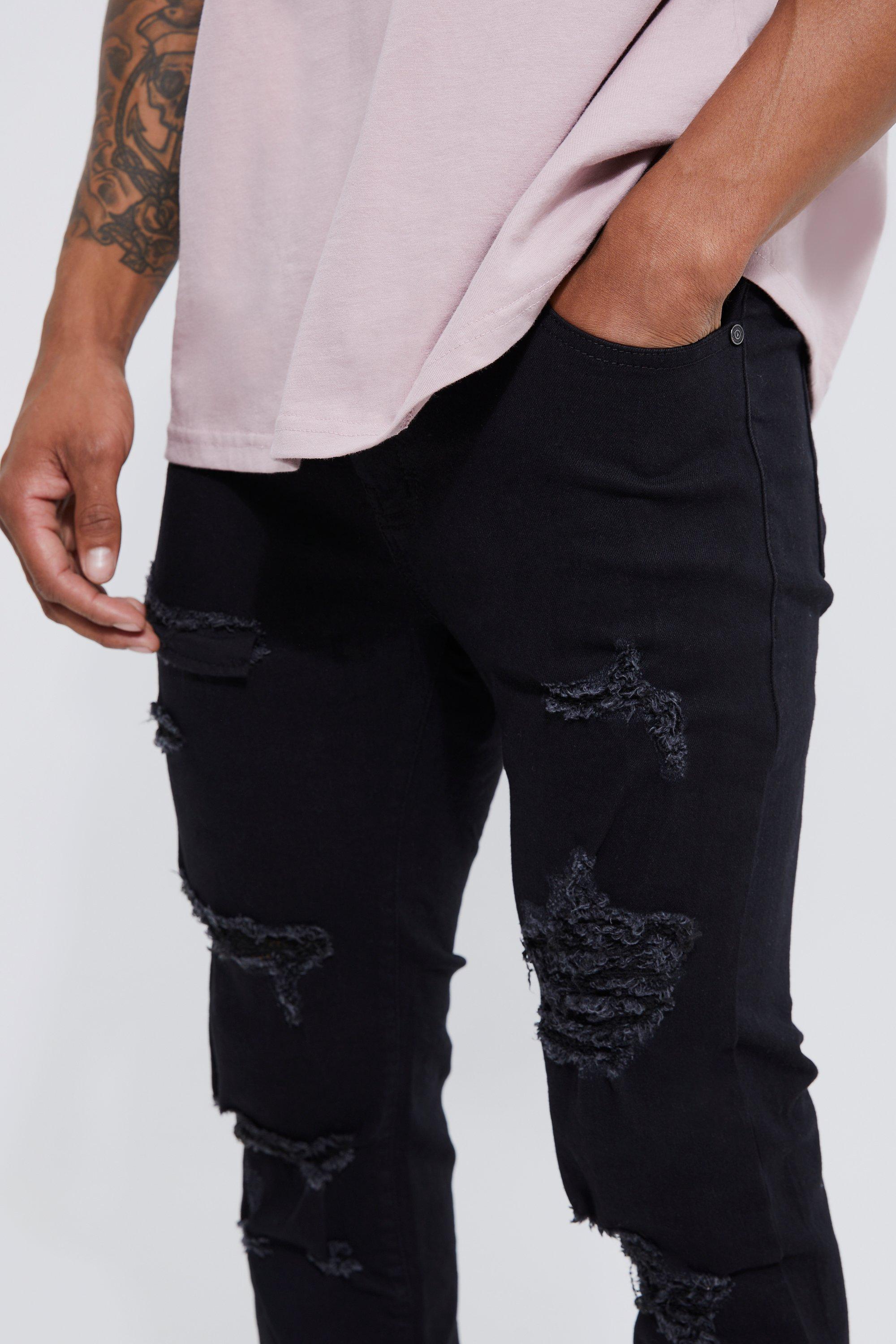 Jean skinny noir dechiré homme hotsell